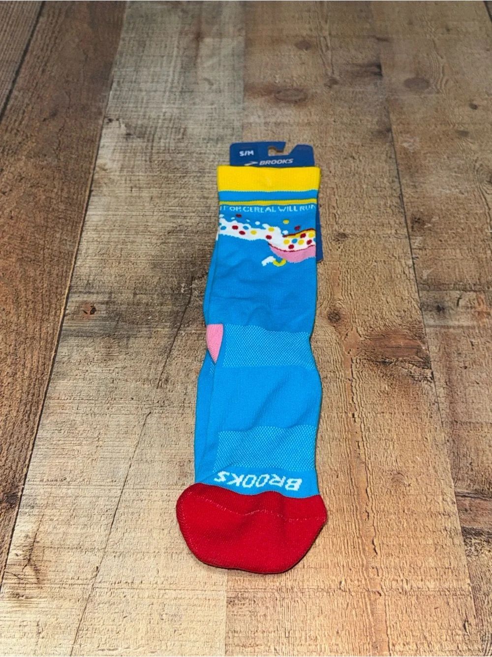 One pair NWT Brooks Crew Socks  
Bowl O’Brooks cereal print 
S/M  fits size 4-9.